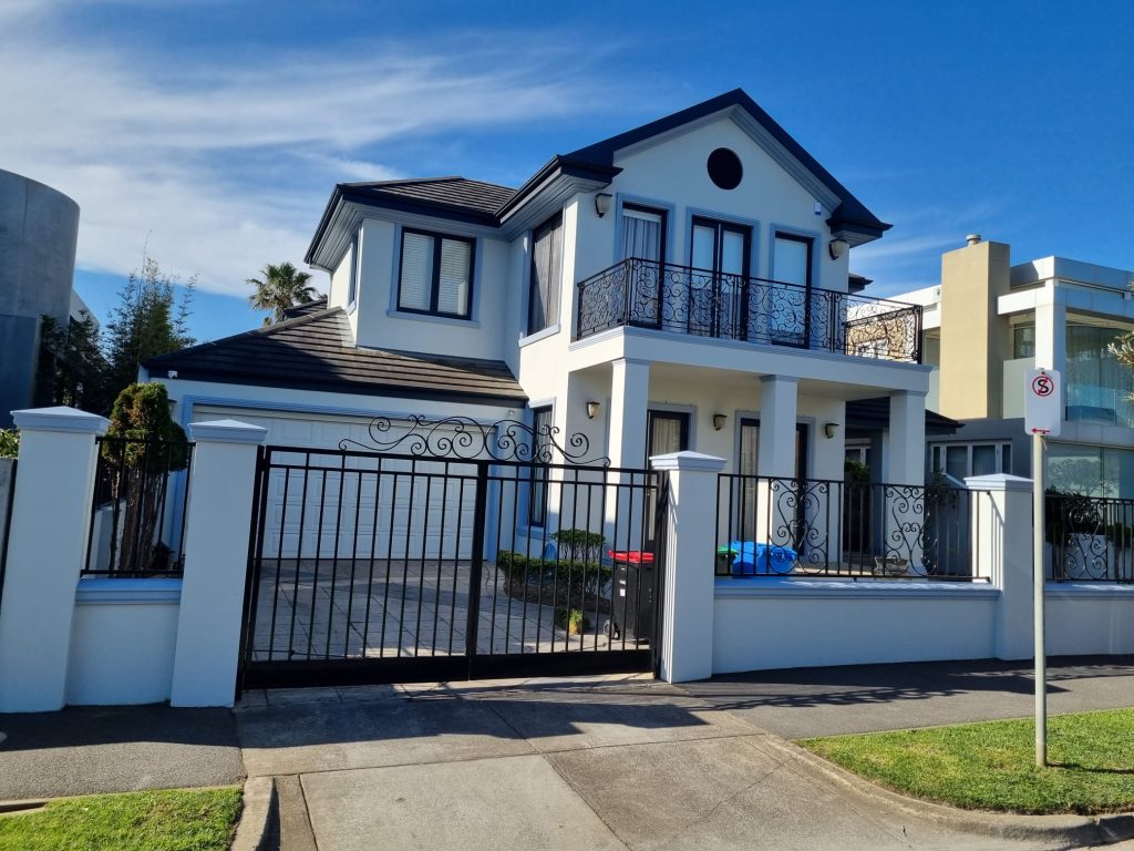 Two-storey Melbourne home with a freshly painted white exterior